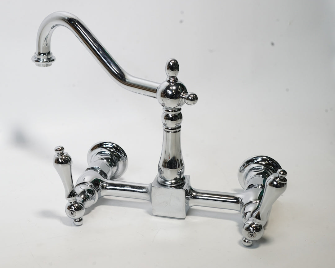 Kingston Brass Tudor 1.8 GPM Wall Mounted Widespread Bridge Kitchen Faucet