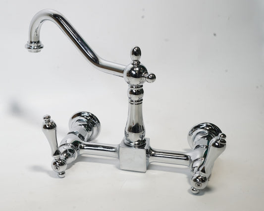 Kingston Brass Tudor 1.8 GPM Wall Mounted Widespread Bridge Kitchen Faucet